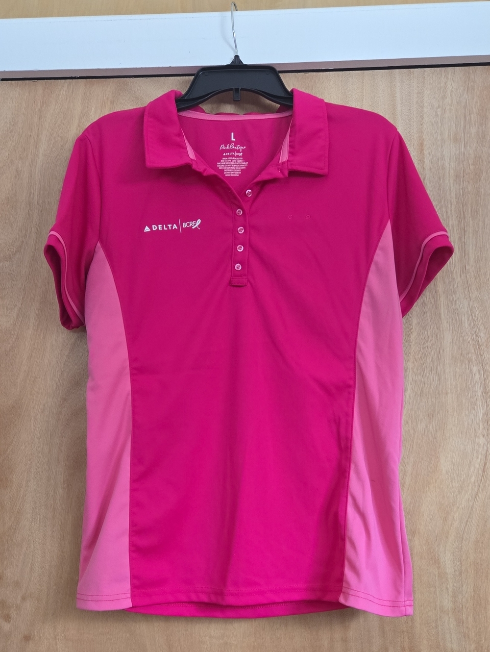 Delta Air Lines Women's Pink Polo Performance Top